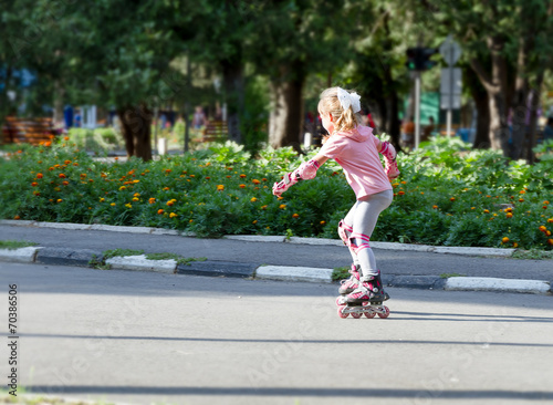 Wallpaper Mural happy child girl roller skating Torontodigital.ca