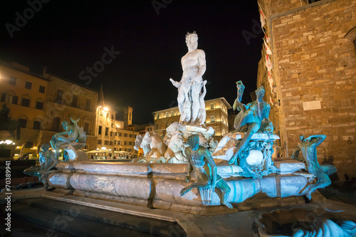 Illuminated Neptune fountain in Florence © PixAchi
