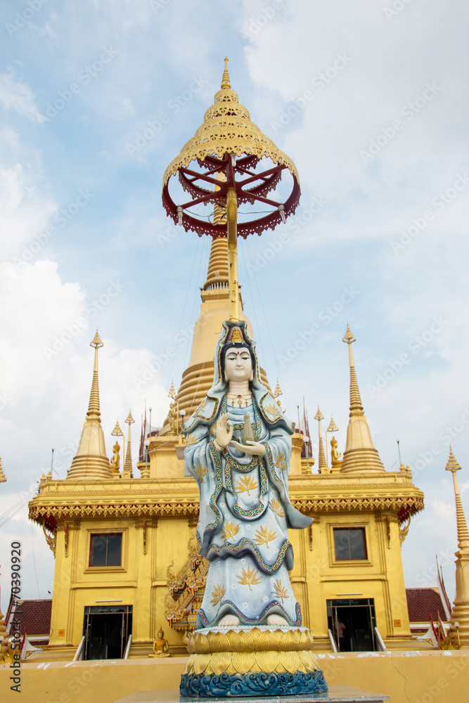 Fototapeta premium Guan Yin statue with blue sky, Thailand