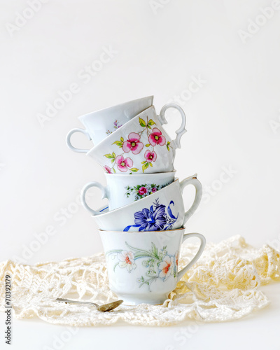 Stack of vintage tea cups for high tea