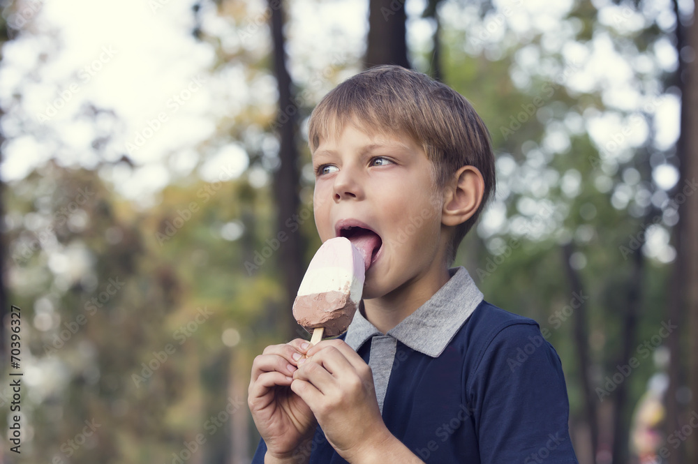 little boy eating an ice cream little boy eating an ice cream