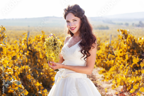 Bride in a vineyard  autumn