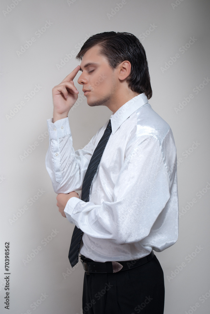 Handsome man in white shirt. Studio white background.