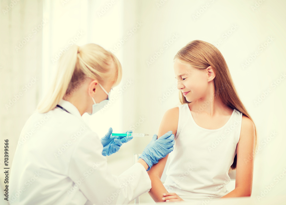 doctor doing vaccine to child in hospital doctor doing vaccine to child in hospital