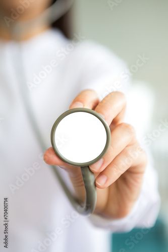 Doctor with stethoscope in the hands