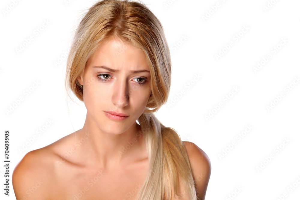 dissatisfied and sad young blonde on white background dissatisfied and sad young blonde on white background