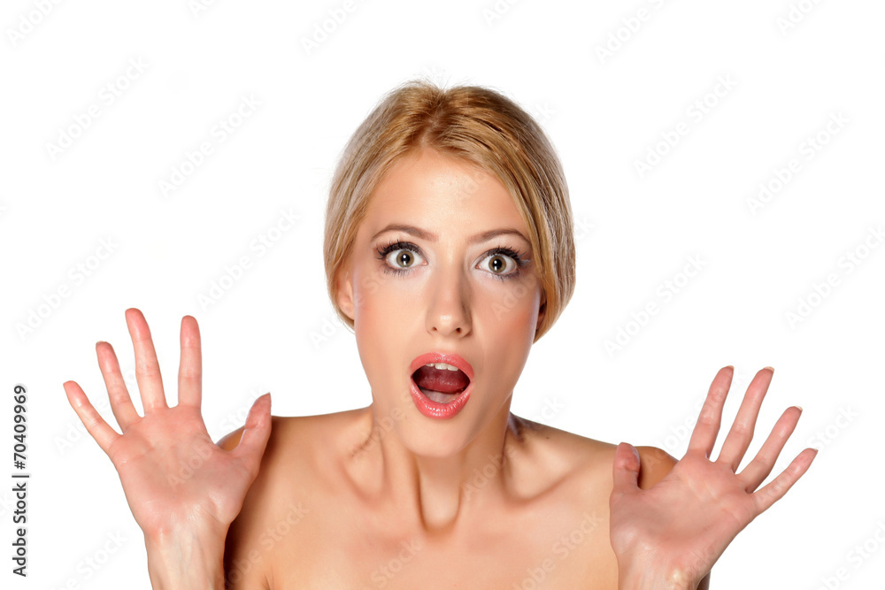 portrait of nervous and desperate beautiful blonde on white