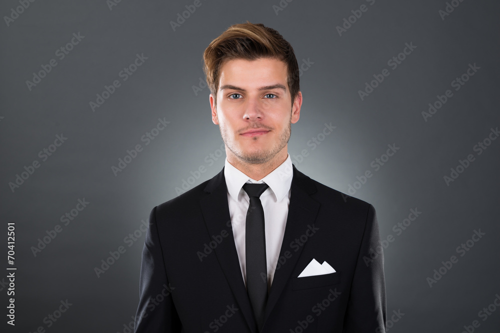 Portrait Of Confident Young Businessman Portrait Of Confident Young Businessman