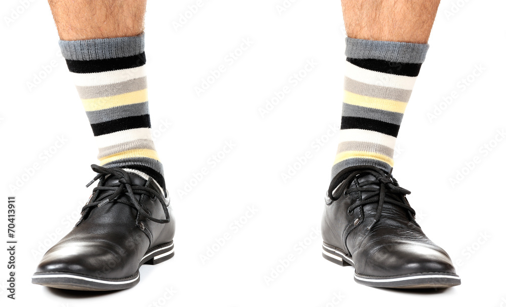 Man leg in suit and colorful socks, isolated on white Man leg in suit and colorful socks, isolated on white
