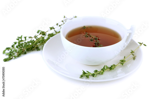 Cup of tasty herbal tea with thyme, isolated on white