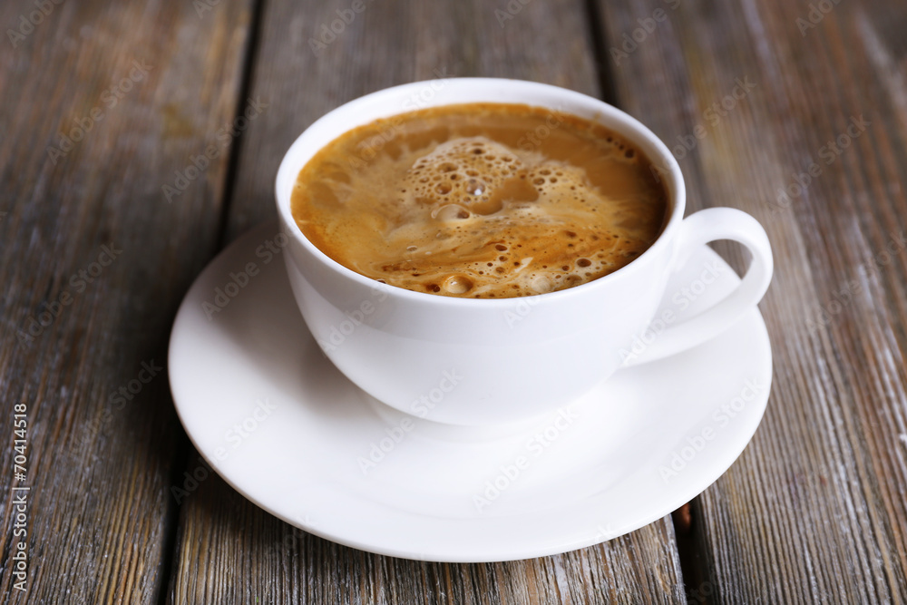 Cup of coffee with milk on wooden background Cup of coffee with milk on wooden background