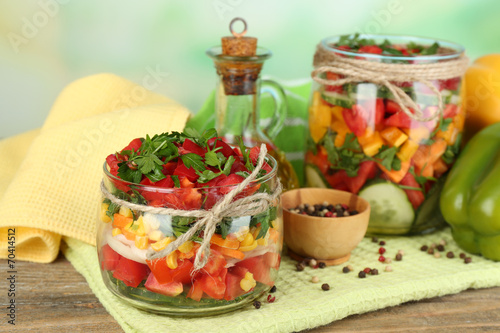 Vegetable salad in glass jars