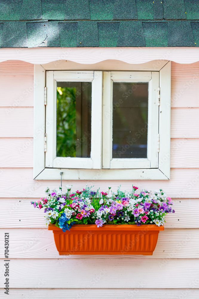 Window and bouquet of flower