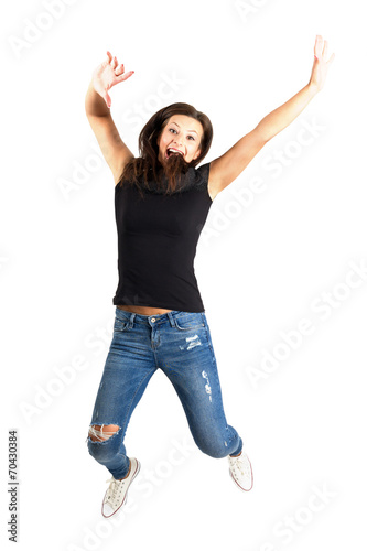 Happy young woman jumping