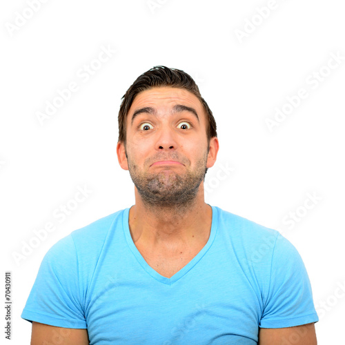 Portrait of man with funny face against white background