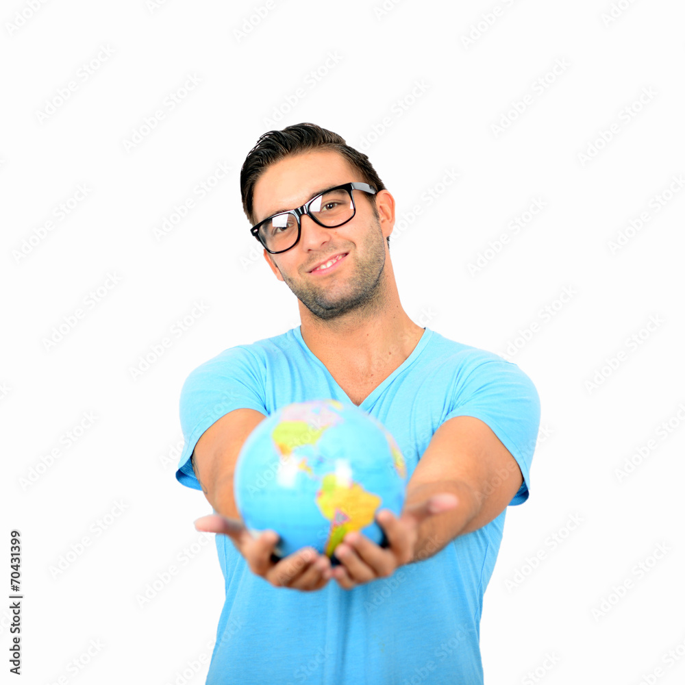 Portrait of young handsome man holding globe in hands against wh Portrait of young handsome man holding globe in hands against wh