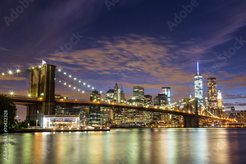 Brooklyn Bridge and Downtown Skyscrapers in New York at Dusk