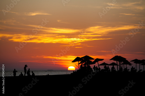 palm beach umbrella at sunset