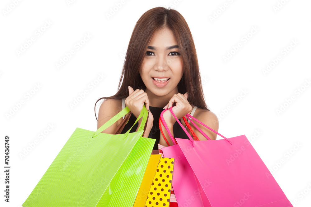 Close up of beautiful Asian woman with colorful shopping bags