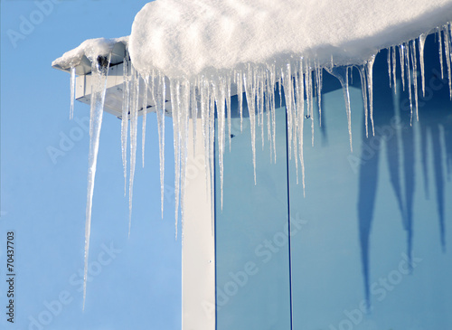 Icicles of ice on the left corner of the roof