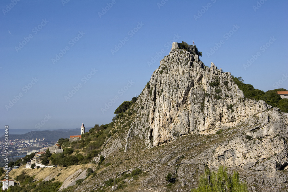 Medieval fortress and town Klis above city of Split in Croatia Medieval fortress and town Klis above city of Split in Croatia