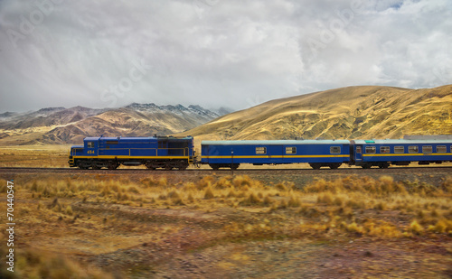 Passenger train in the entrance to La Raya and Pukara, Puno, Pe