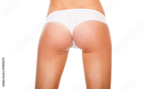 Buttocks in a white panties