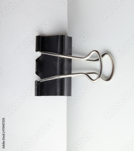 Blank paper with clip isolated in white background