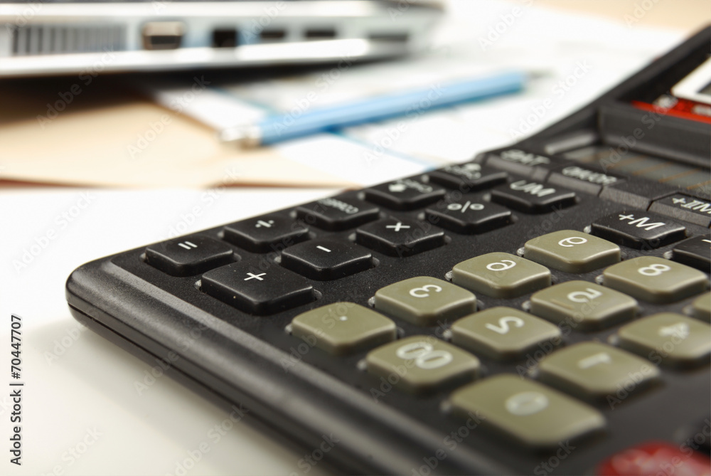 Calculator, pen, folder with documents Calculator, pen, folder with documents