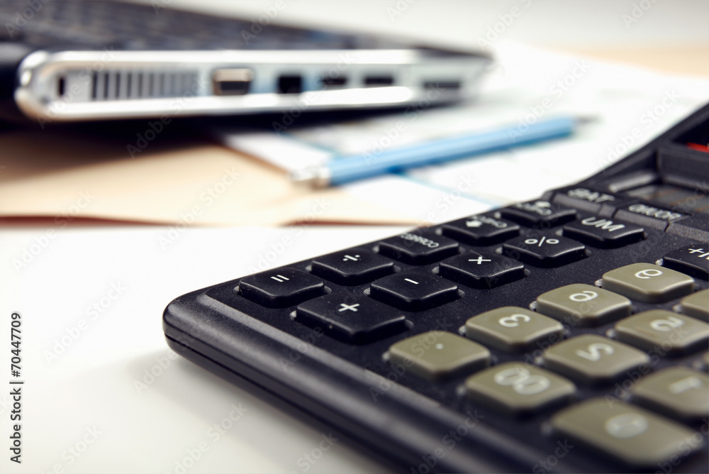 Calculator, pen, folder with documents Calculator, pen, folder with documents