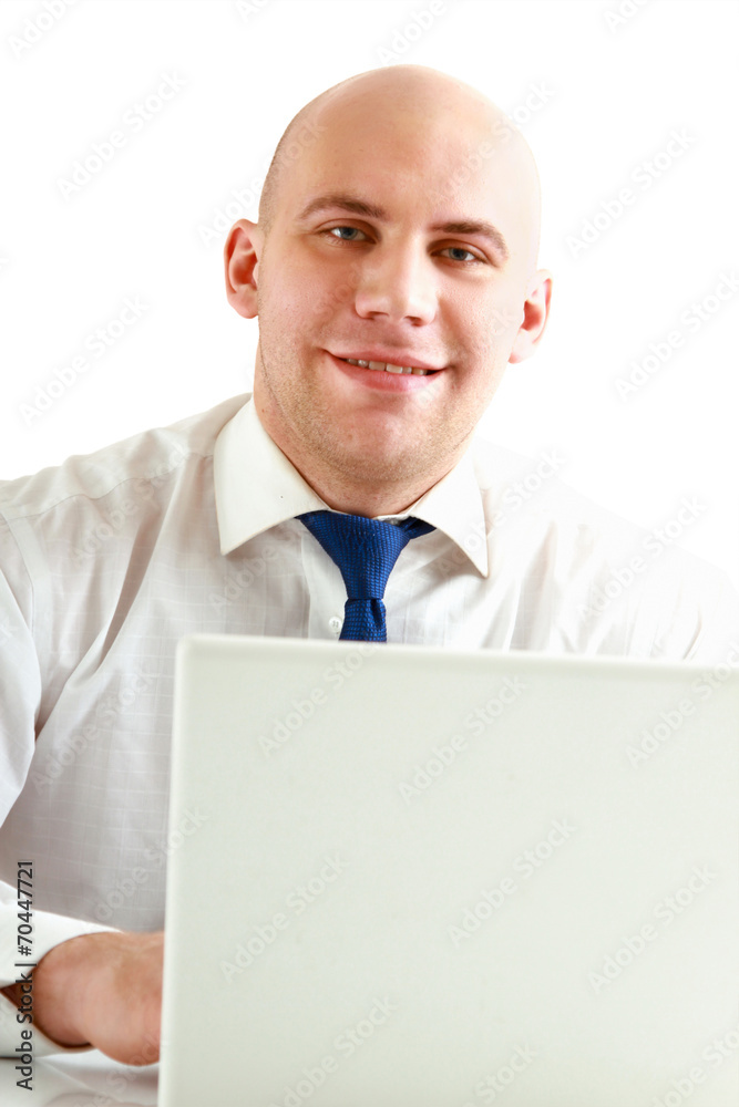 Young businessman at his workplace, isolated on white Young businessman at his workplace, isolated on white
