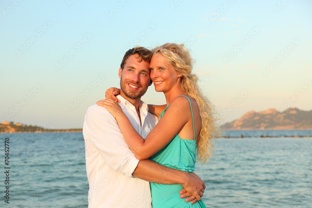Beach couple romantic in love at sunset Beach couple romantic in love at sunset