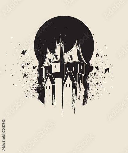 Dark gothic house against black moon photo