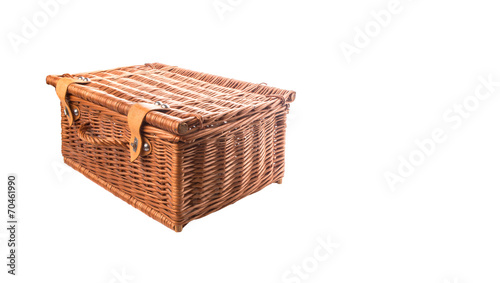 Handmade wicker picnic basket over white background