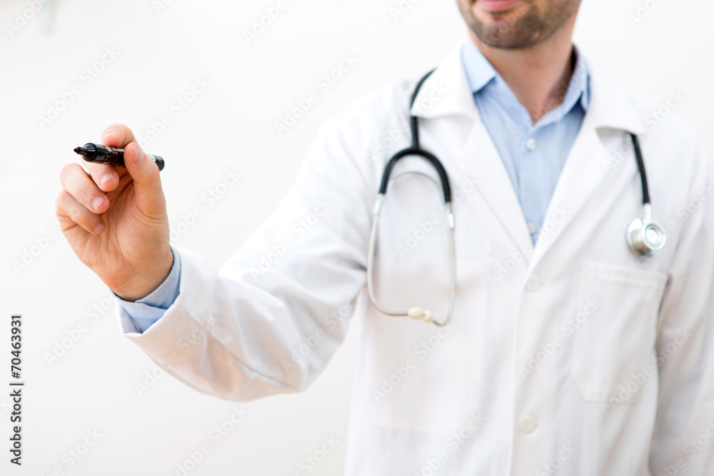 Professional doctor writing on a touchscreen interface Professional doctor writing on a touchscreen interface