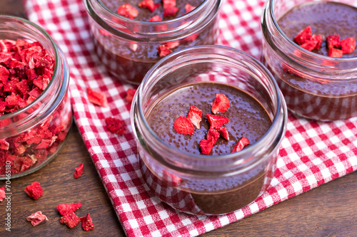 Chocolate chia seed puddings with dried strawberries