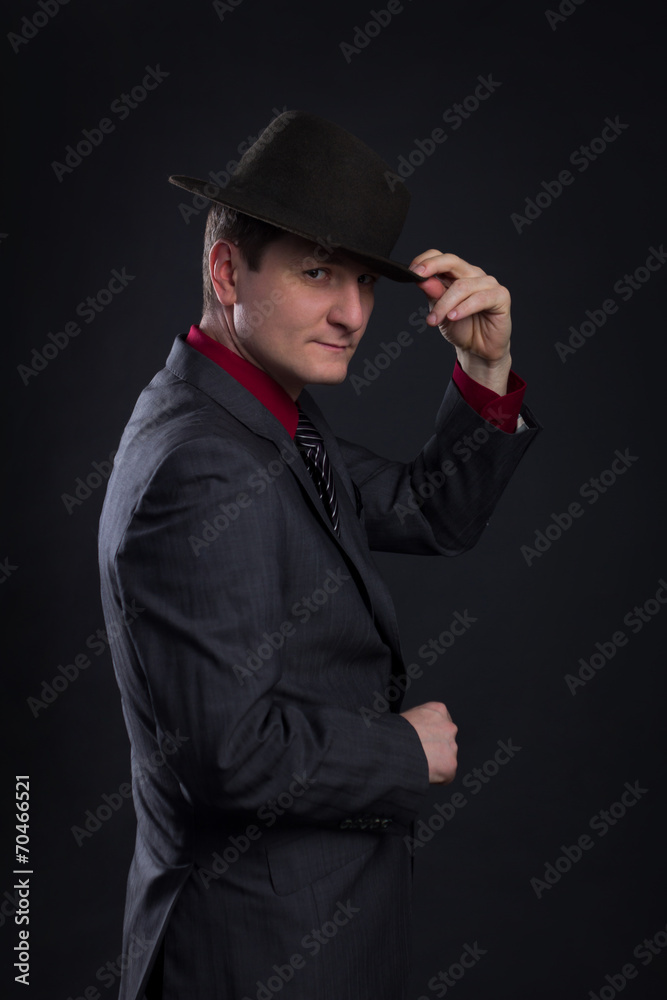 portrait of men with hat in the darkness portrait of men with hat in the darkness
