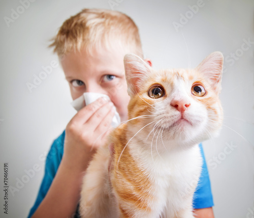 A boy with cat allergy photo