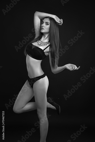studio photo of posing sexy woman
