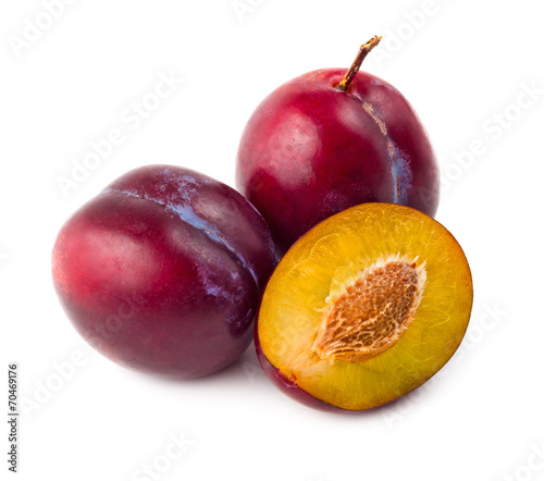 Fresh plums isolated on white