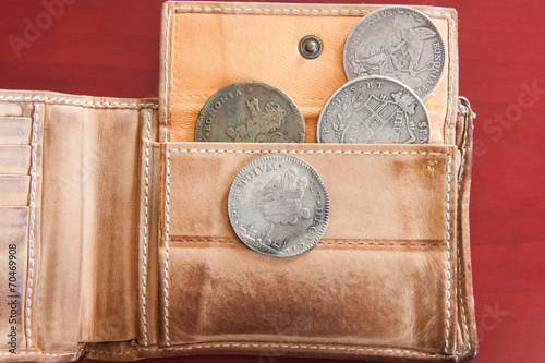 ancient coins in purse