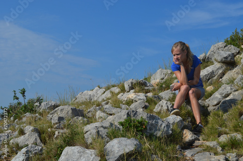 Girl resting on mountain