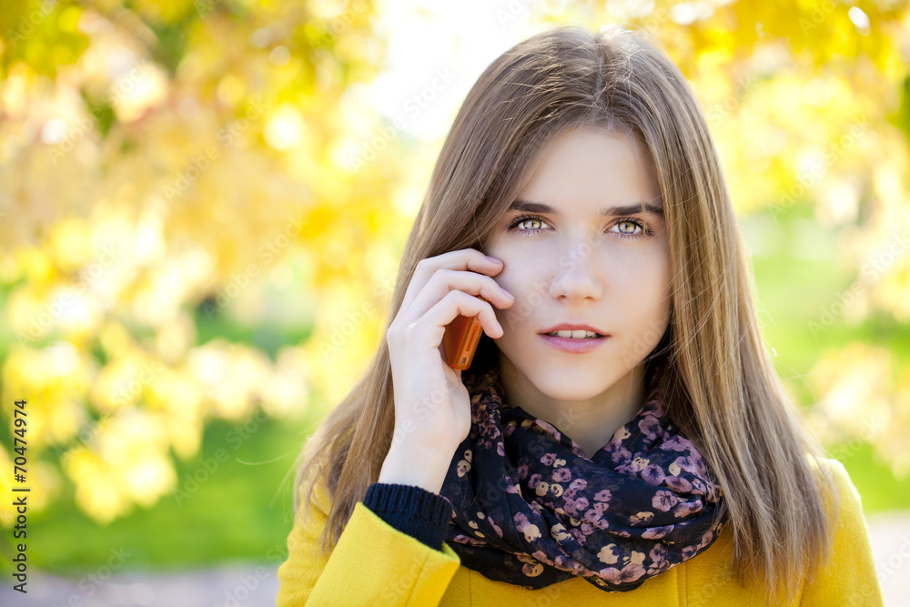 Happy beautiful woman calling by phone Happy beautiful woman calling by phone