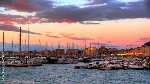 Pink sunrise over the marina © xfargas