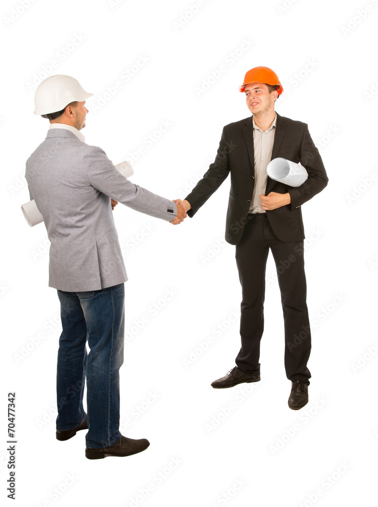 Two Male Young Engineers Shaking Hands Two Male Young Engineers Shaking Hands