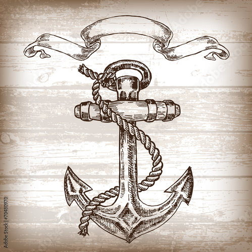 Vintage anchor on wooden background. Hand drawn vector