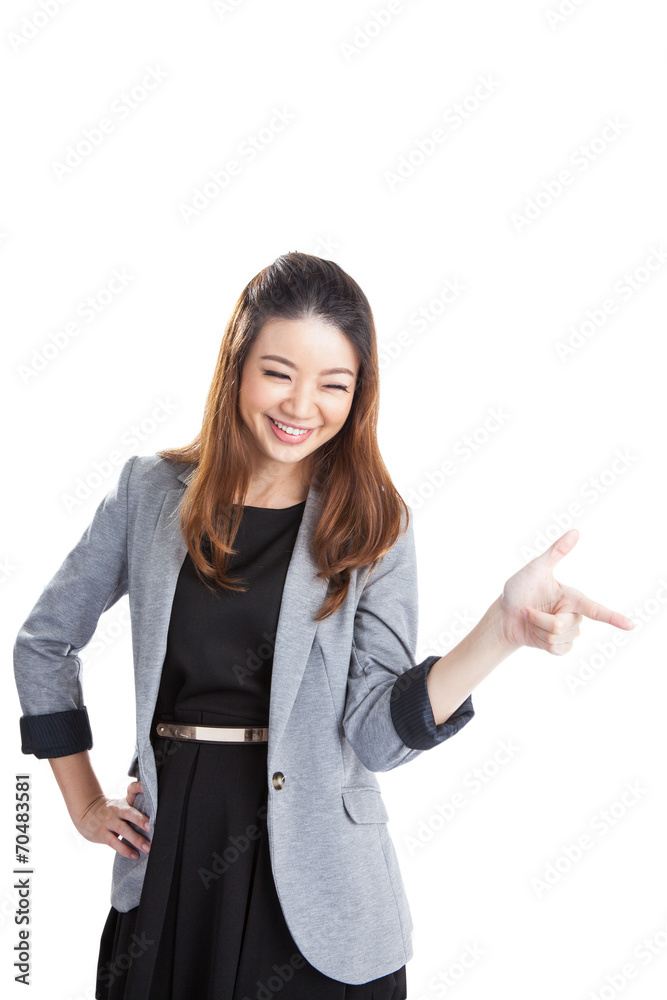 Woman pointing and looking to the side Woman pointing and looking to the side