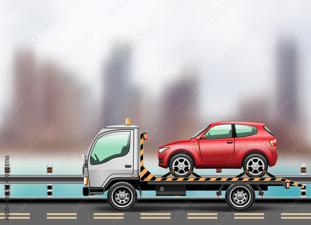 Fototapeta premium tow truck loaded up the car