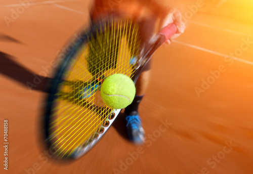 male tennis player in action © Mikael Damkier