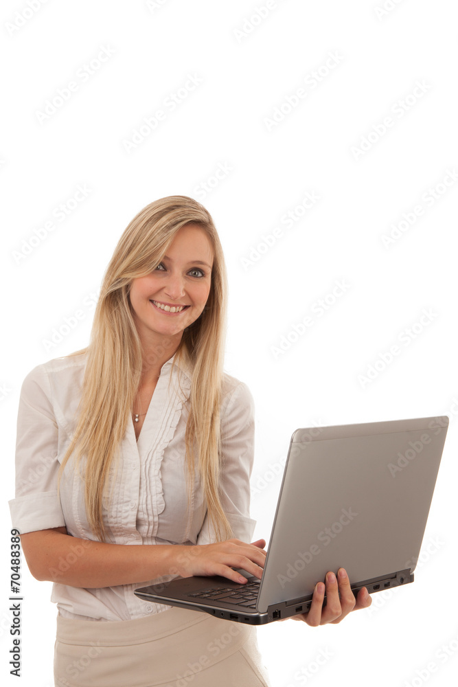 Smiling Blond Woman Holding Laptop in Studio Smiling Blond Woman Holding Laptop in Studio